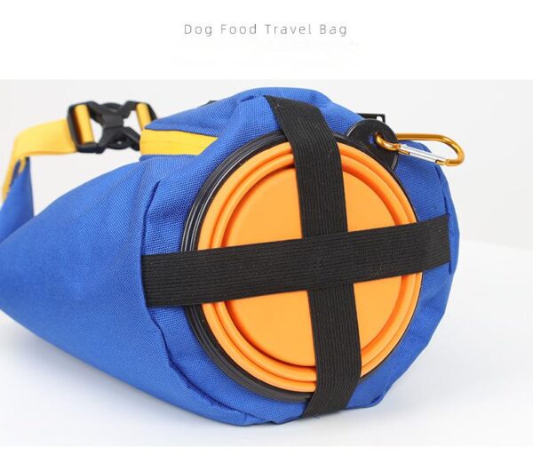 Dog eating from collapsible bowl beside bag