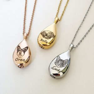 Teardrop-shaped custom pet photo necklace with engraved dog portrait